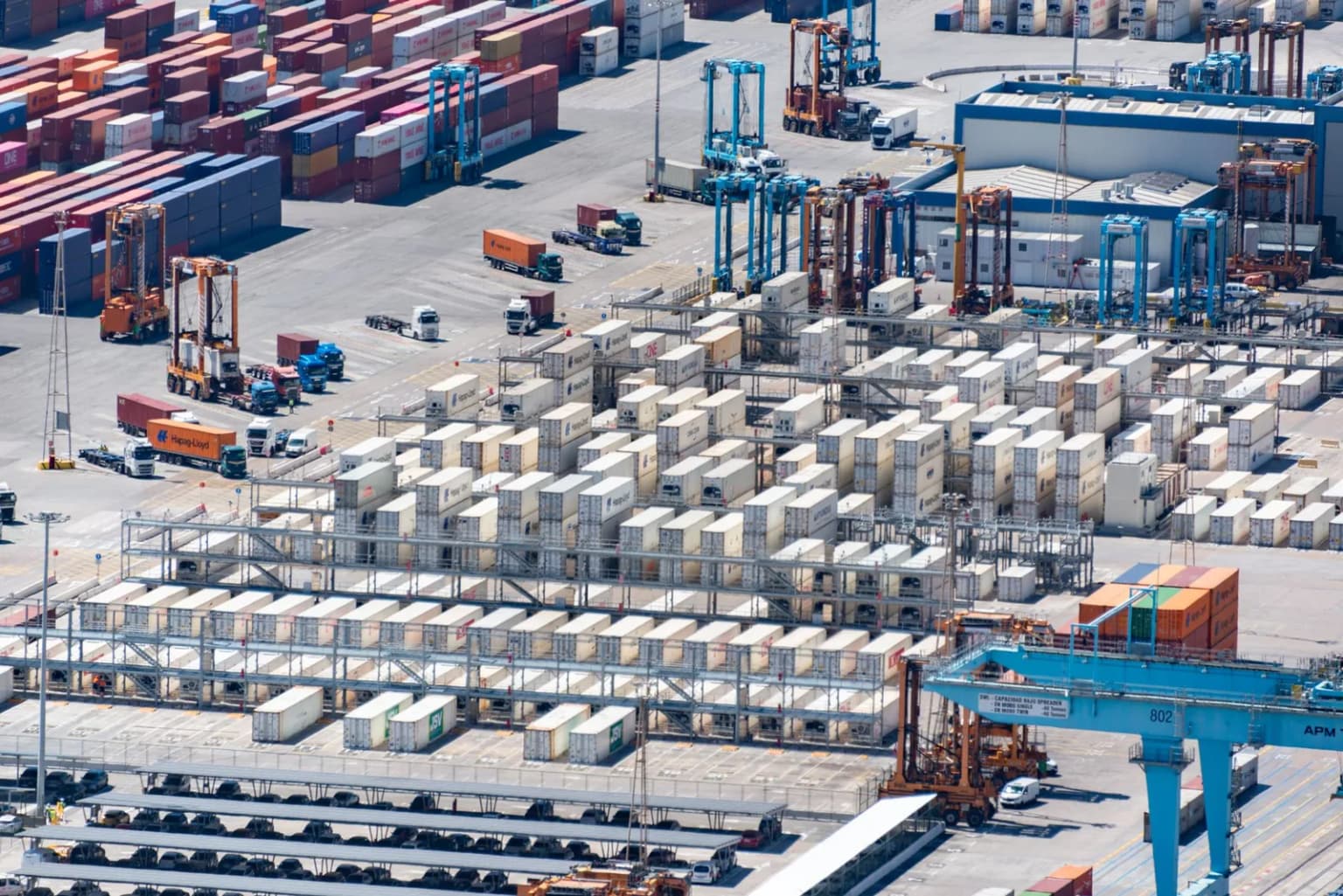 Cargo containers and cranes at a working international port